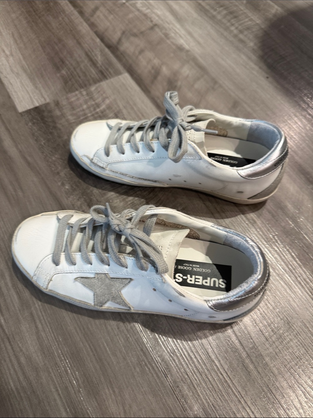 Golden Goose Super Star White Sneakers with Silver Star Accent